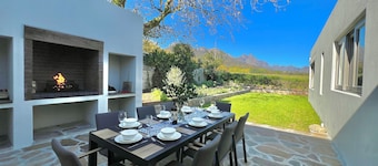 New Listing! Breathtaking views of Jonkershoek valley mountains and vineyards.