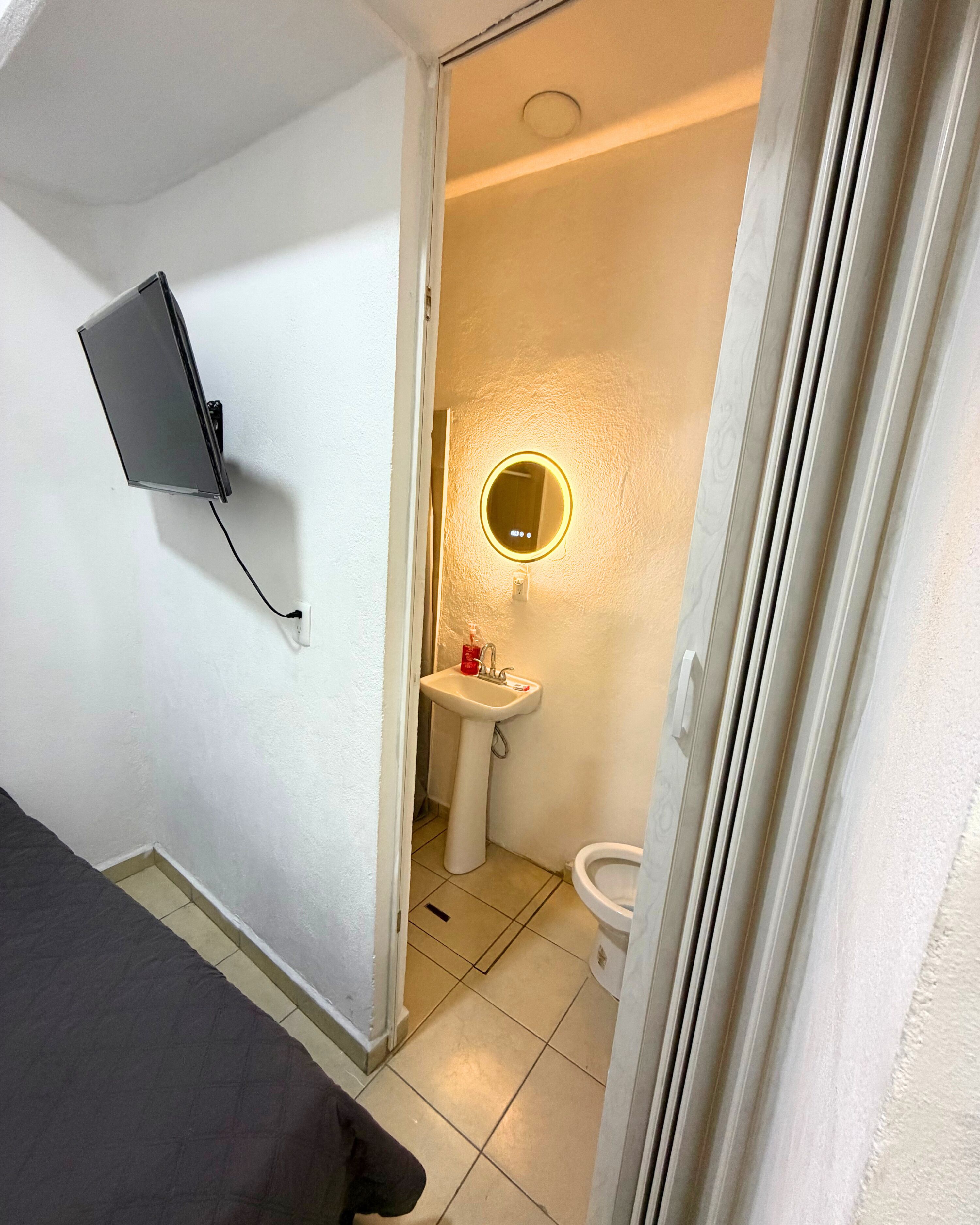 Shower, towels, soap, toilet paper