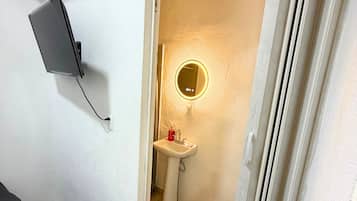 Shower, towels, soap, toilet paper