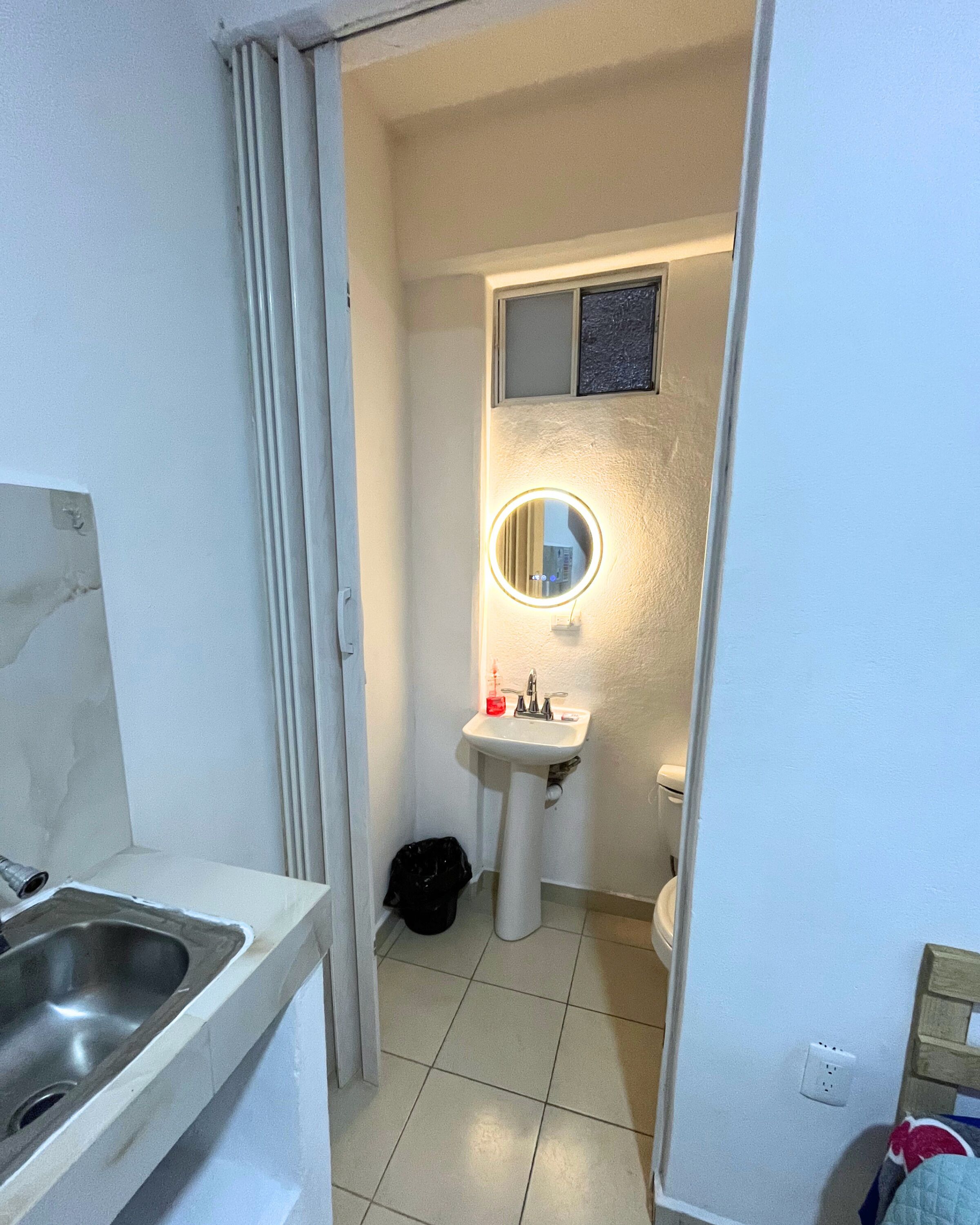 Basic Room, 1 Queen Bed | Bathroom | Shower, towels, soap, toilet paper