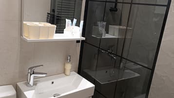 Hair dryer, towels, soap, toilet paper
