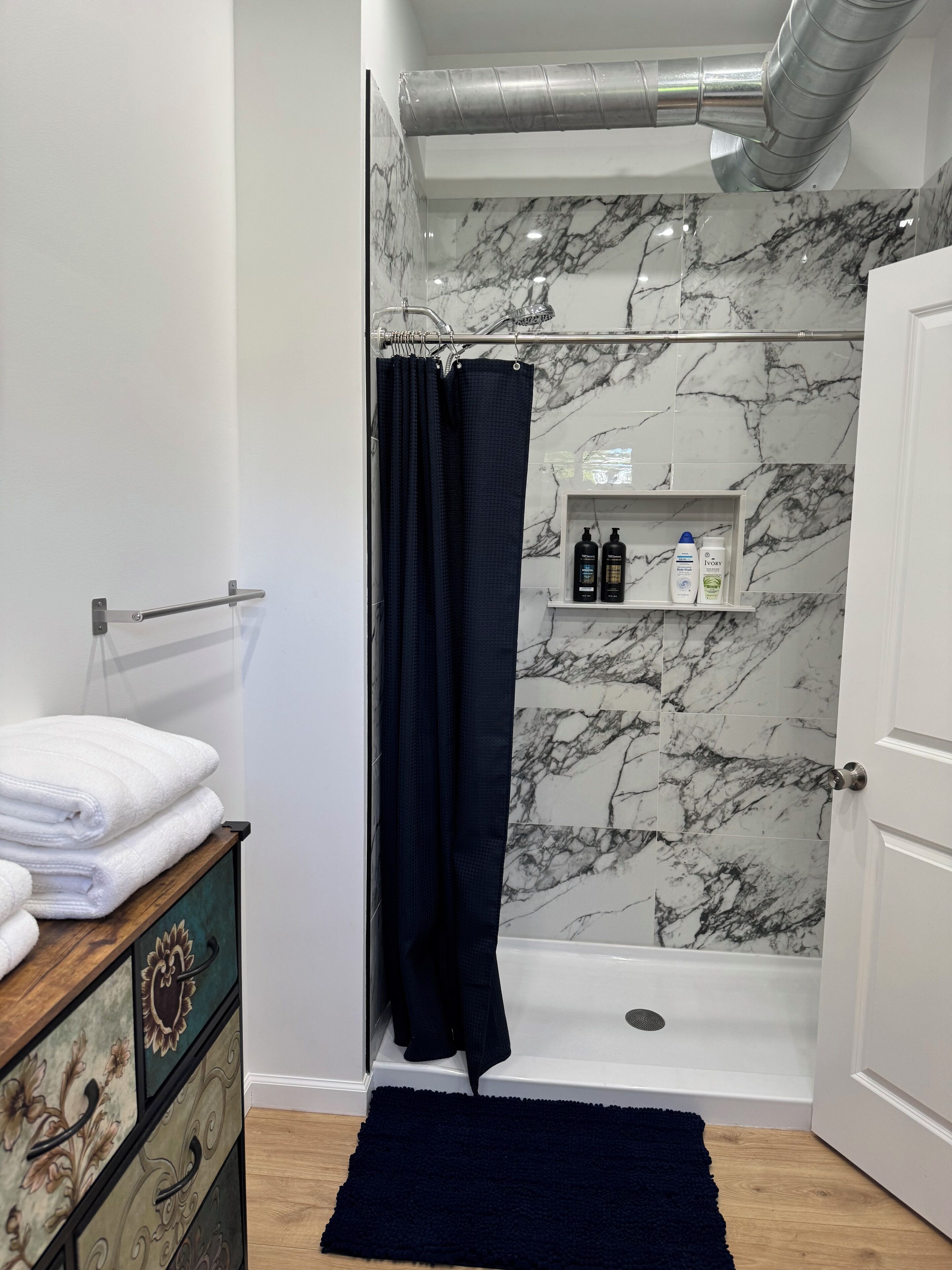 Hair dryer, towels, soap, toilet paper