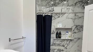 Hair dryer, towels, soap, toilet paper