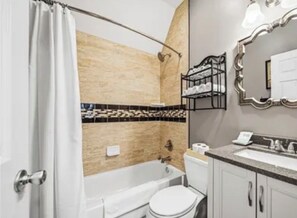 Hair dryer, towels, soap, toilet paper