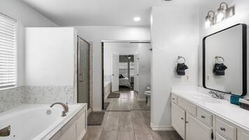 Jetted bath, hair dryer, towels, soap