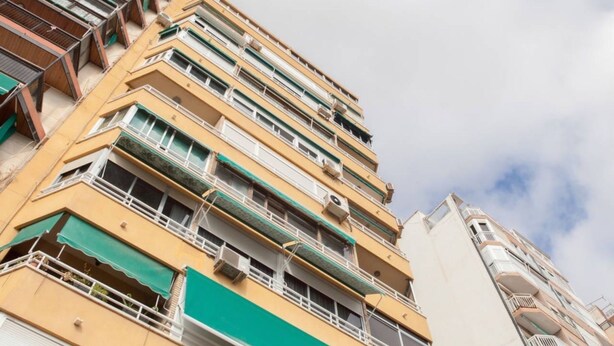 A multi-story building with balconies and air conditioning units. - ESTUDIO PLAYA POSTIGUET by Interhome (Alicante)
