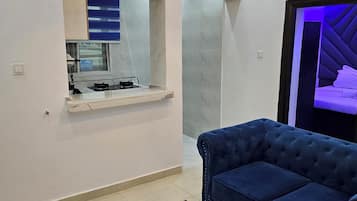 Superior Studio Suite, City View | Living area