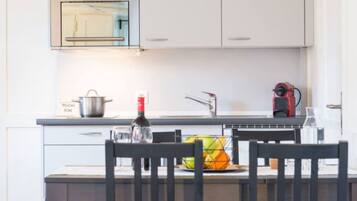 Fridge, microwave, cookware/dishes/utensils