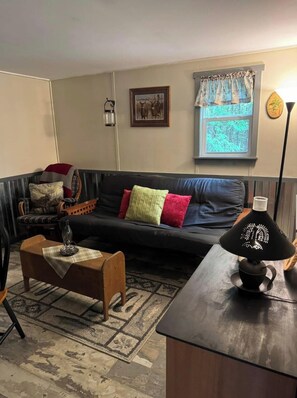 Living area -  1-bedroom off grid cabin in serene Woodville perfect for relaxing getaway (Woodville)