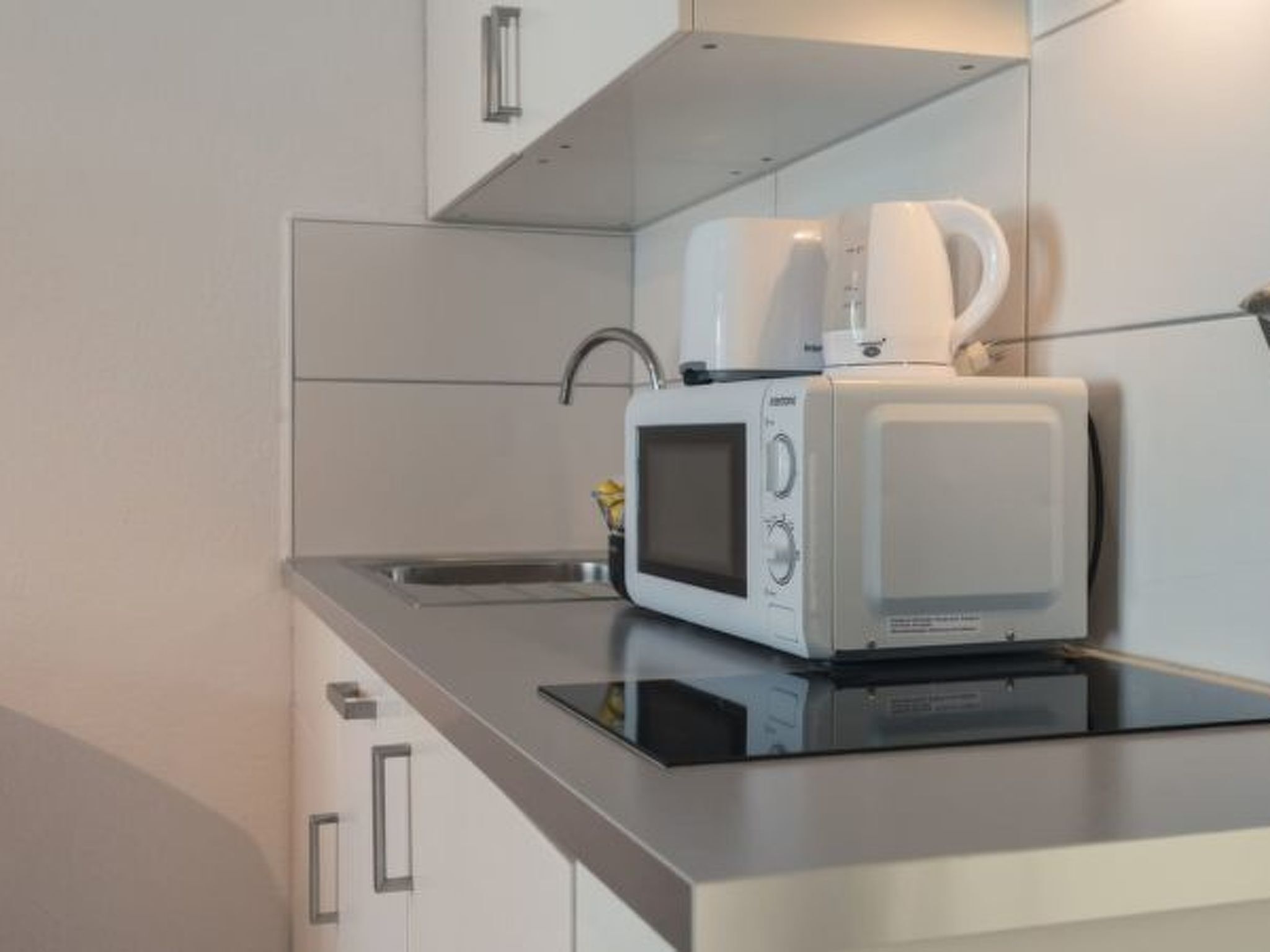 Fridge, microwave, cookware/dishes/utensils