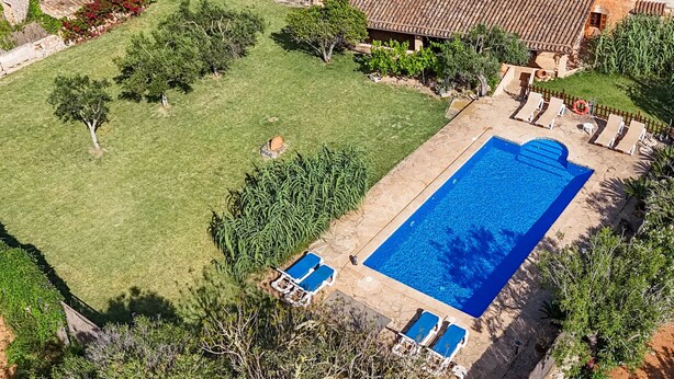 A residential property with a swimming pool, lawn, and stone buildings. - Finca Can Nin by Interhome (Santanyí)