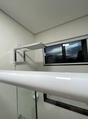 Shower, free toiletries, hair dryer, towels