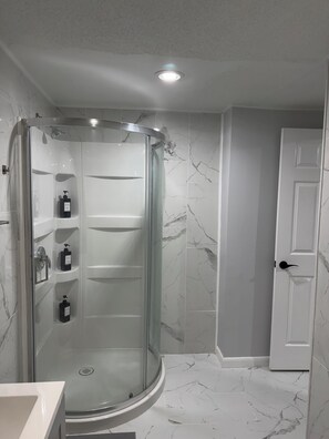 Hair dryer, towels, soap, toilet paper