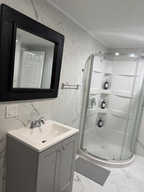 Hair dryer, towels, soap, toilet paper