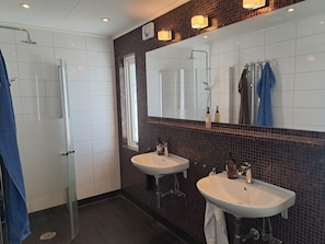 Shower, hair dryer, towels, soap