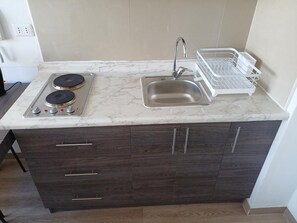 Private kitchen - Cozy and easily accessible apartment, with a view of the mountain range. (Santiago)