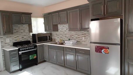 Private kitchen. Hilltop overlooking the stunning beach at Love Hill, Central Andros Island.