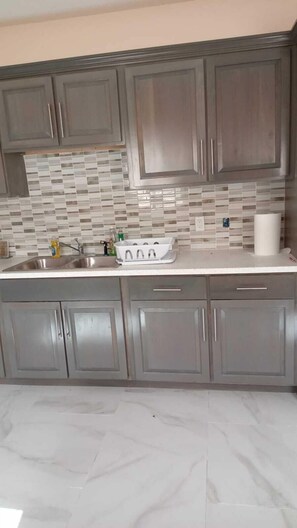 Private kitchen - Hilltop overlooking the stunning beach at Love Hill, Central Andros Island. (Andros Island)