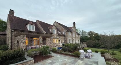 Spacious 7-bedroom estate on 10+ acres in lovely Villanova with pool and jacuzzi