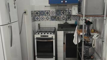 Estúdio clássico, vista para o jardim | Cozinha privada