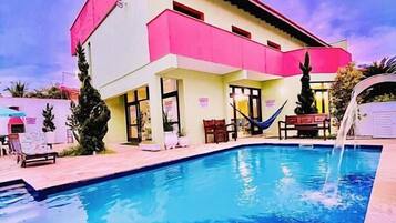 Outdoor pool, pool umbrellas, sun loungers