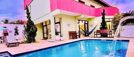 Outdoor pool, pool umbrellas, pool loungers
