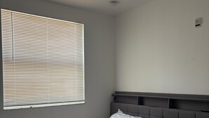 A bedroom with a bed, a headboard, a window with blinds, and a smoke detector on the wall. - 3BR house+loft near Wynwood, perfec getaway! (Miami)