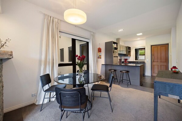 Dining - Lake Hayes retreat offers breathtaking mountain and lake views with modern luxury amenities. (Lake Hayes)