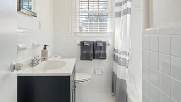 Hair dryer, towels, soap, toilet paper