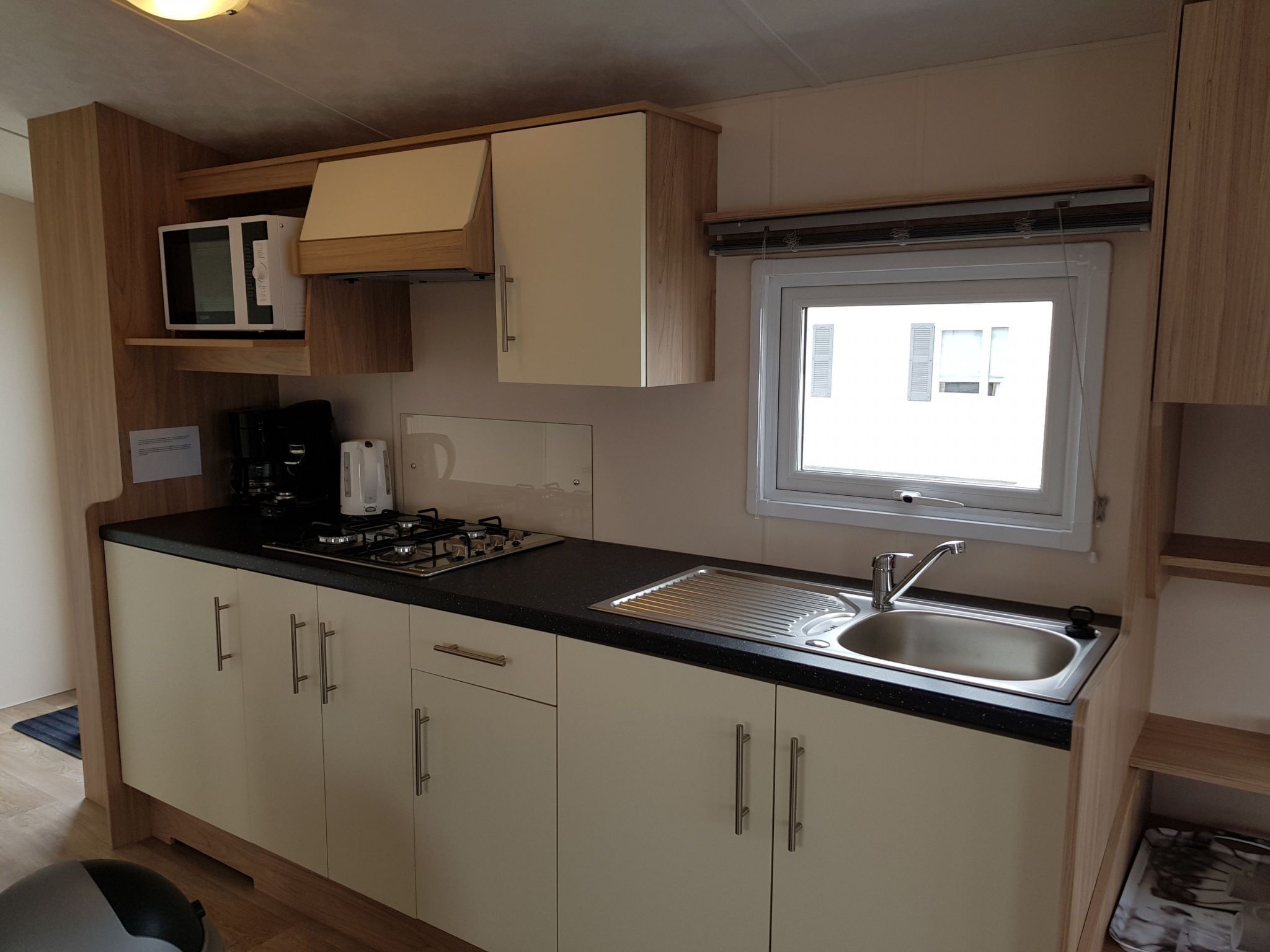 Fridge, microwave, cookware/dishes/utensils