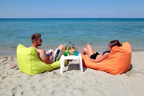 Private beach, beach volleyball, rowing