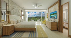 A bedroom with a large bed, a TV, a balcony with a view, and a bathroom with a vanity. - Sandals Dunn's River Falls (Ocho Rios)