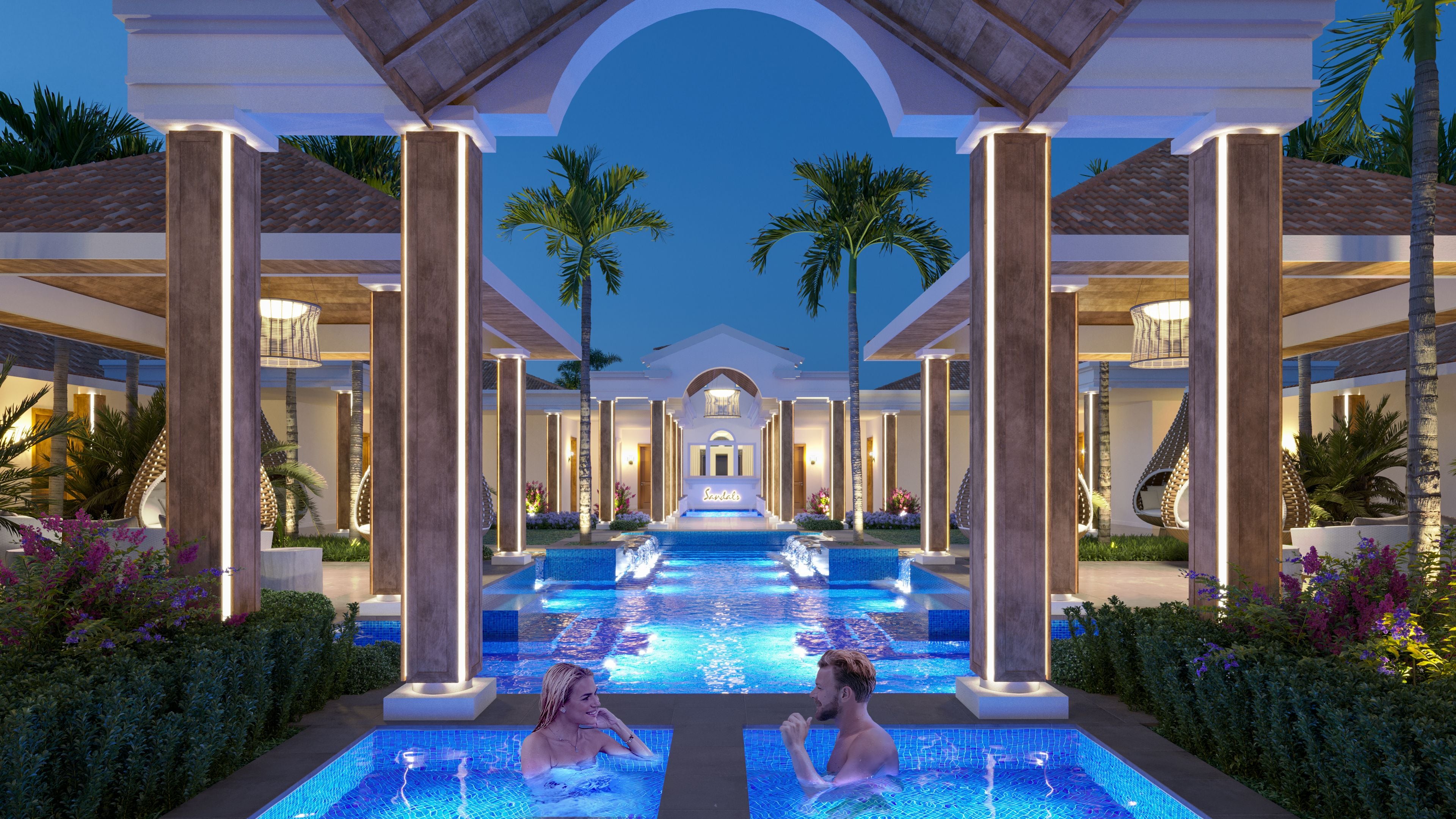 A resort pool area with multiple pools, palm trees, and a central archway.