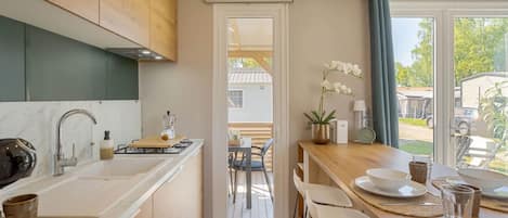 Fridge, microwave, cookware/dishes/utensils