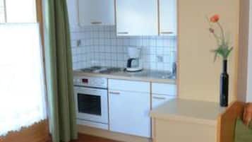 Fridge, oven, cookware/dishes/utensils