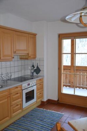 Fridge, oven, dishwasher, cookware/dishes/utensils - Haus Helvetia, (Samnaun-Compatsch). by Interhome (Samnaun)