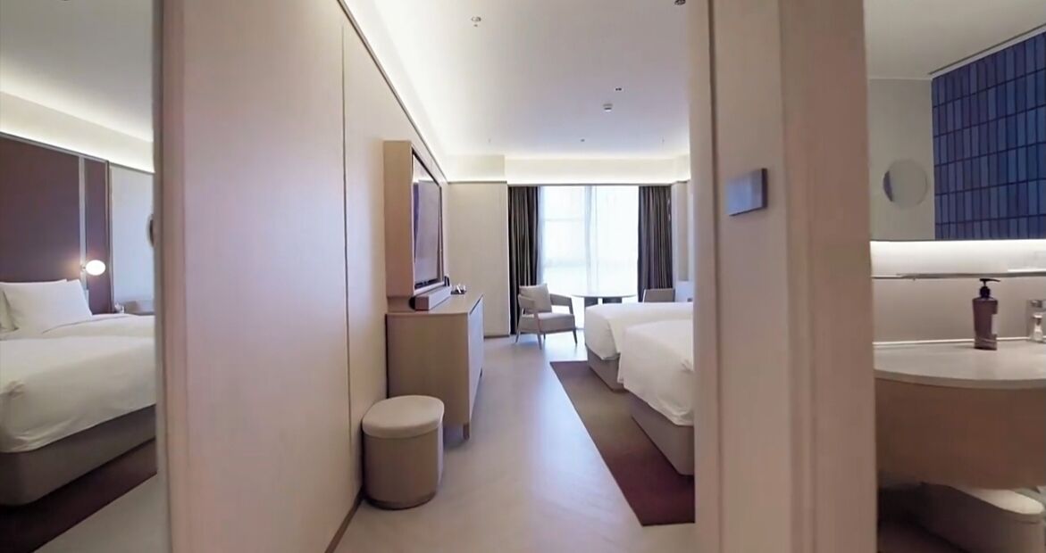 Premium bedding, down comforters, memory foam beds, free minibar