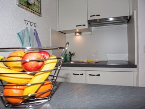 Fridge, cookware/dishes/utensils - Atlantis Apartments, (Samnaun-Ravaisch). by Interhome (Samnaun-Ravaisch)