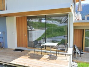 Outdoor dining - Chasa Paoletta, (Ramosch). by Interhome (Ramosch)