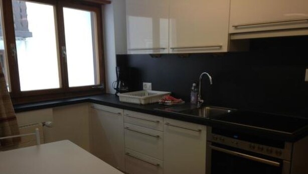 Fridge, oven, cookware/dishes/utensils - Ferienwohnungen Chasa Valär, (Scuol) by Interhome (Scuol)