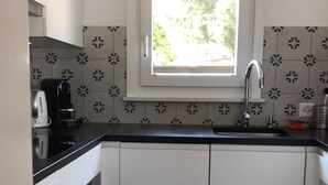 Fridge, oven, dishwasher, cookware/dishes/utensils - Ferienhaus Chasa Refugi, (Müstair) by Interhome (Müstair)