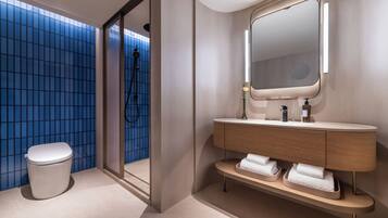 Shower, free toiletries, hair dryer, slippers