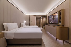 Ropa de cama de alta calidad y minibar con artículos gratuitos 