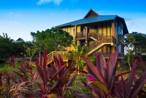A two-story building with a balcony and a staircase. - Indura Beach & Golf Resort, Curio Collection (Tela)