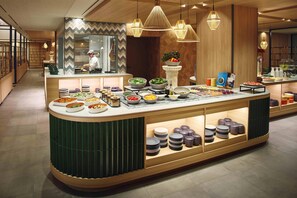 A buffet setup with various food items and dishes. - ANA Holiday Inn Resort Karuizawa by IHG (Naganohara)