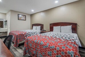 A hotel room with two beds, a desk, and a chair. - Super 8 by Wyndham Waco North I-35 (Waco)