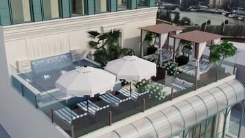 Outdoor pool, open 6:30 AM to 7:00 PM, pool umbrellas, pool loungers