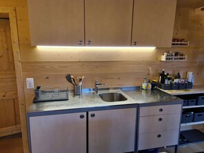 Fridge, oven, cookware/dishes/utensils - Maiensäss Tegia Cucagna, Rueun, (Rueun). by Interhome (Rueun)