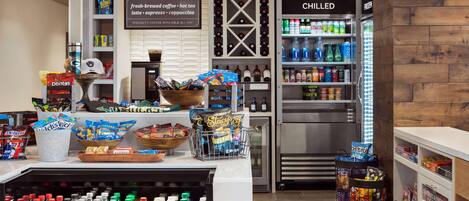 A shop with a variety of snacks, beverages, and specialty coffee.