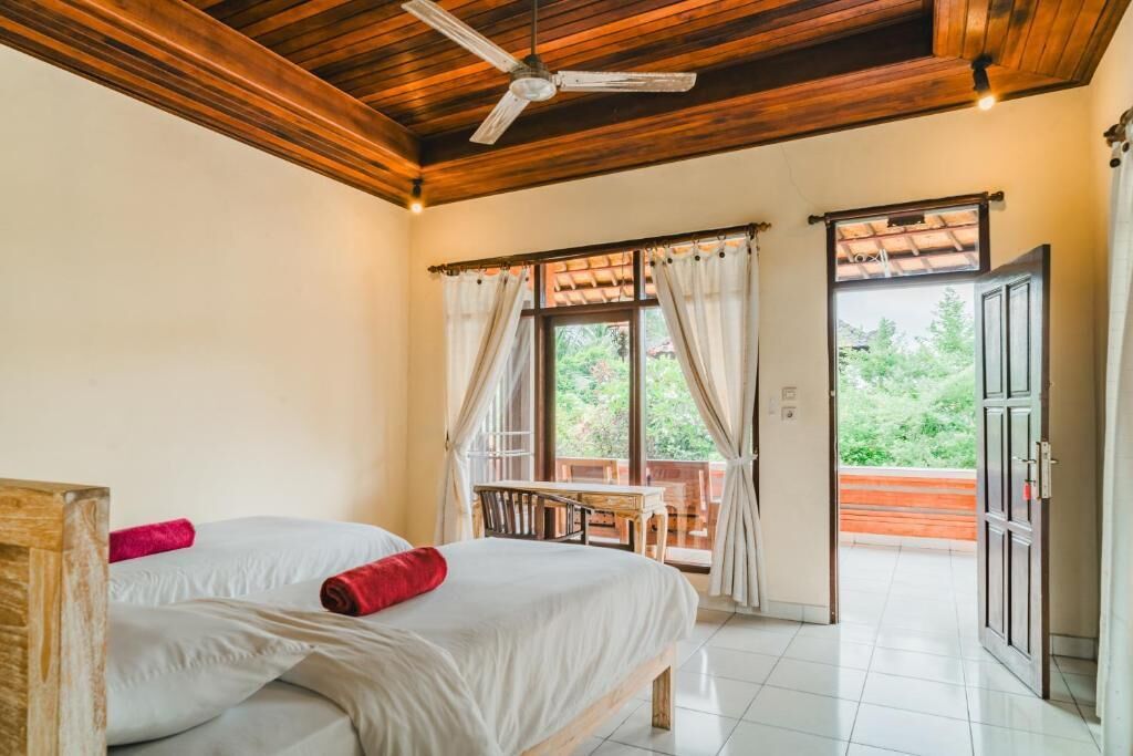 Quarto duplo superior, vista para o jardim